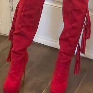 Red faux suede above the knee boots.